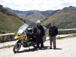 Stopped on a high pass, these fellow travelers admire the BMW