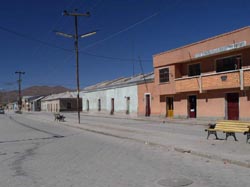 A main street in dirty, windswept and unkempt Uyuni, Bolivia