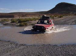 Water hazard on the road to Uyuni.  I had just stopped when this truck approached.  I found my way around the side.