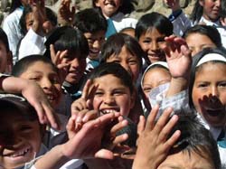 School kids in Potosi clamor to have their picture taken